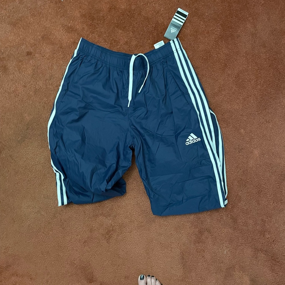 Blue and white Adidas sweatpants